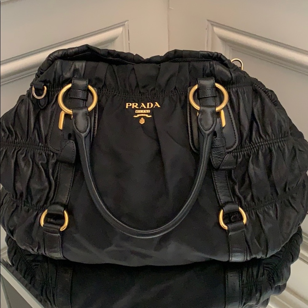 Black leather Prada medium size purse